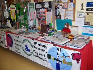 Landmine/cluster bomb awareness table at school