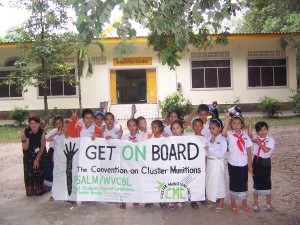 Children in Laos with sign painted by PSALM students